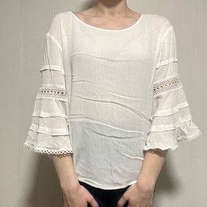 White blouse with lacy sleeves